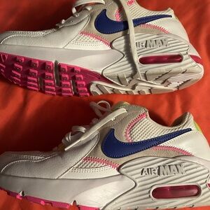 Nike White Sneakers with Blue Swoosh and Pink Accents